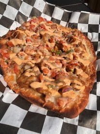 Mexican Pizza Crispy Flatbread Topped with Queso, Grilled Chicken, Jack Cheese, Chipotle Sauce, and Pico De Gallo $12